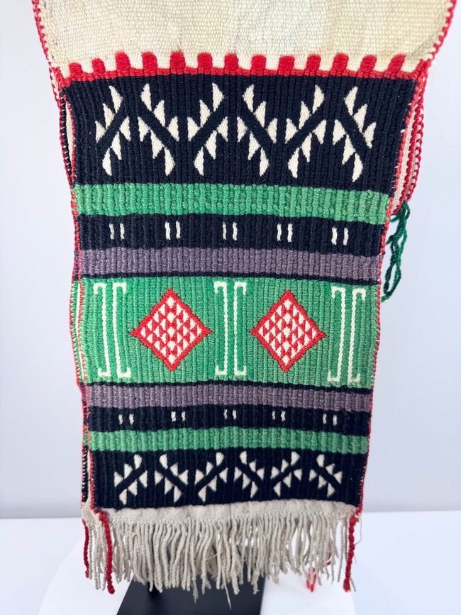 Southwestern Pueblo ceremonial textile with red, turquoise, black and purple patterns