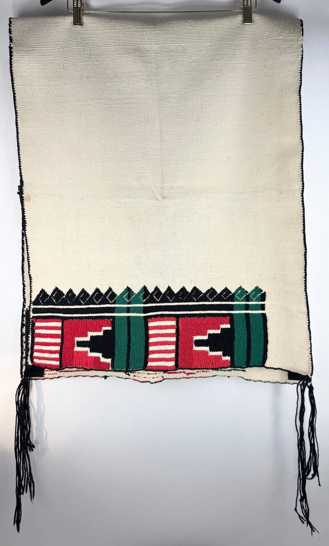 Southwestern Pueblo ceremonial textile with geometric motifs and tasseled corner ties