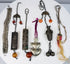Group of six antique Chinese garment ornaments and amulets dating to the late Qing and early Republic periods