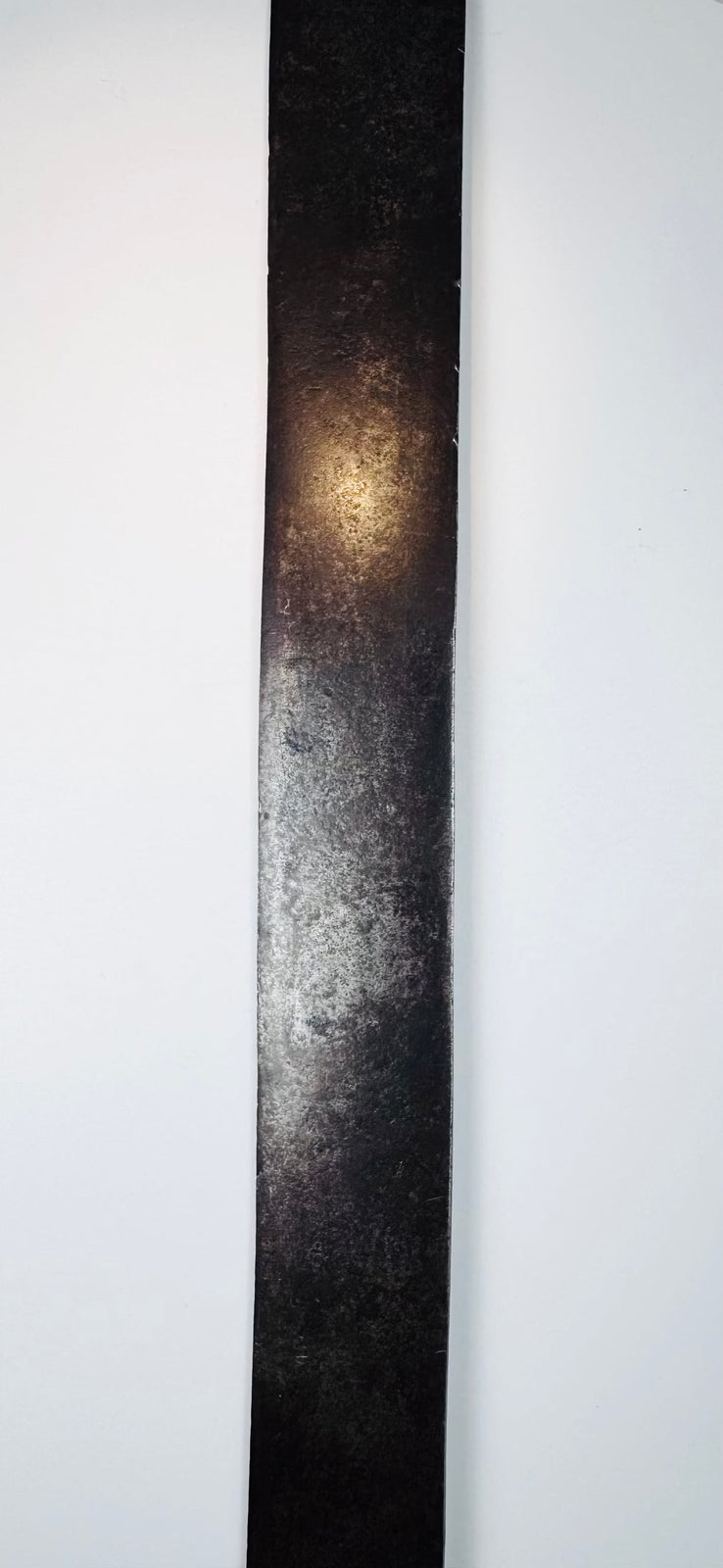 Broad forged steel blade on an attributed Colonial American short sword measuring 23.5 inches long