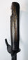 Aged forged steel blade displaying dark patination, oxidation, pitting and tooling marks