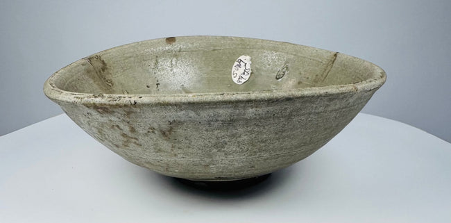 Early Vietnamese ceramic bowl with original kiln irregularities and jade-like colouring