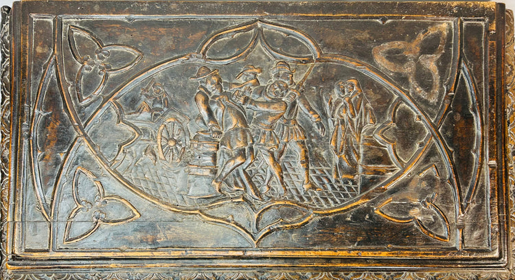 Hand-carved Renaissance Italian forziere with deeply carved figures, scrollwork, and decorative relief panels
