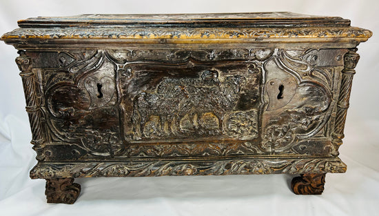 Early Baroque / late Renaissance Italian cassone chest with pastoral scenes and ornate carved detailing