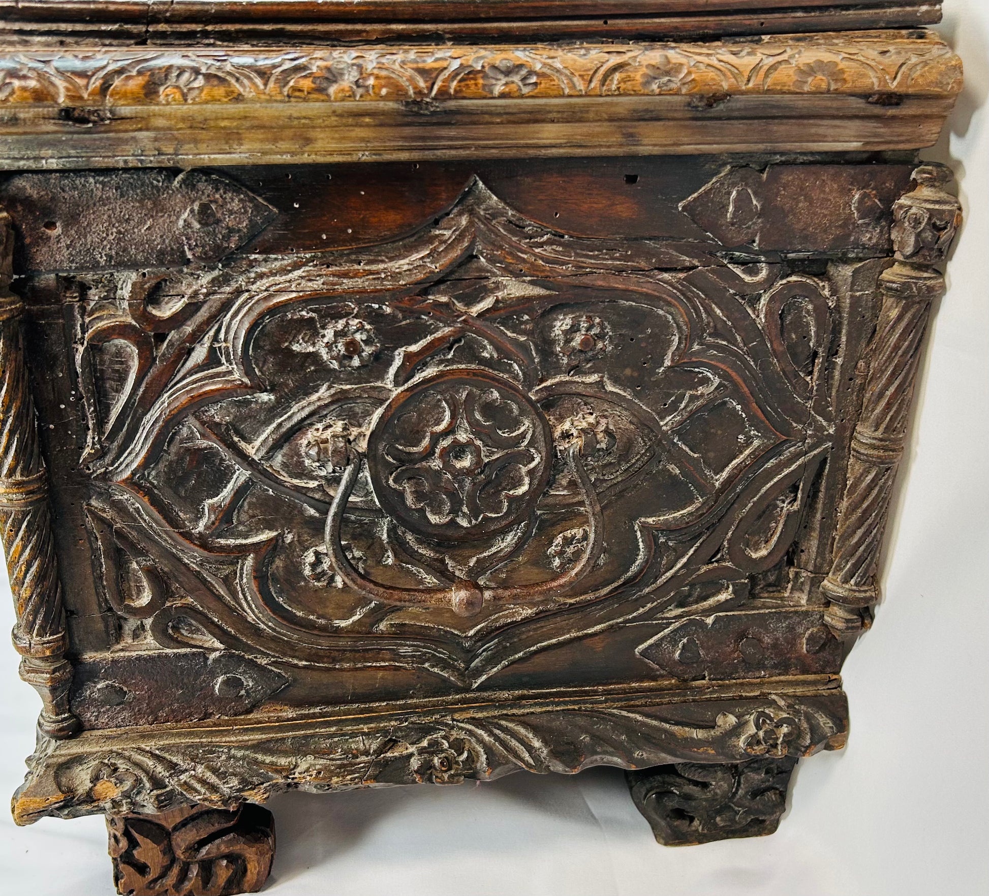 16th–17th century Italian cassone with symbolic narrative carving, classical scroll feet, and warm antique patina