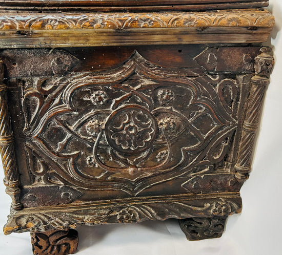16th–17th century Italian cassone with symbolic narrative carving, classical scroll feet, and warm antique patina