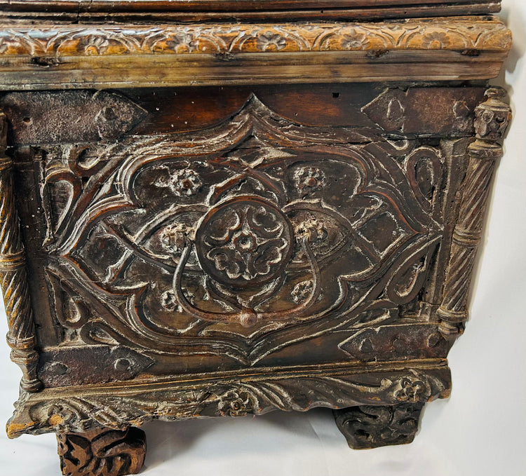 16th–17th century Italian cassone with symbolic narrative carving, classical scroll feet, and warm antique patina
