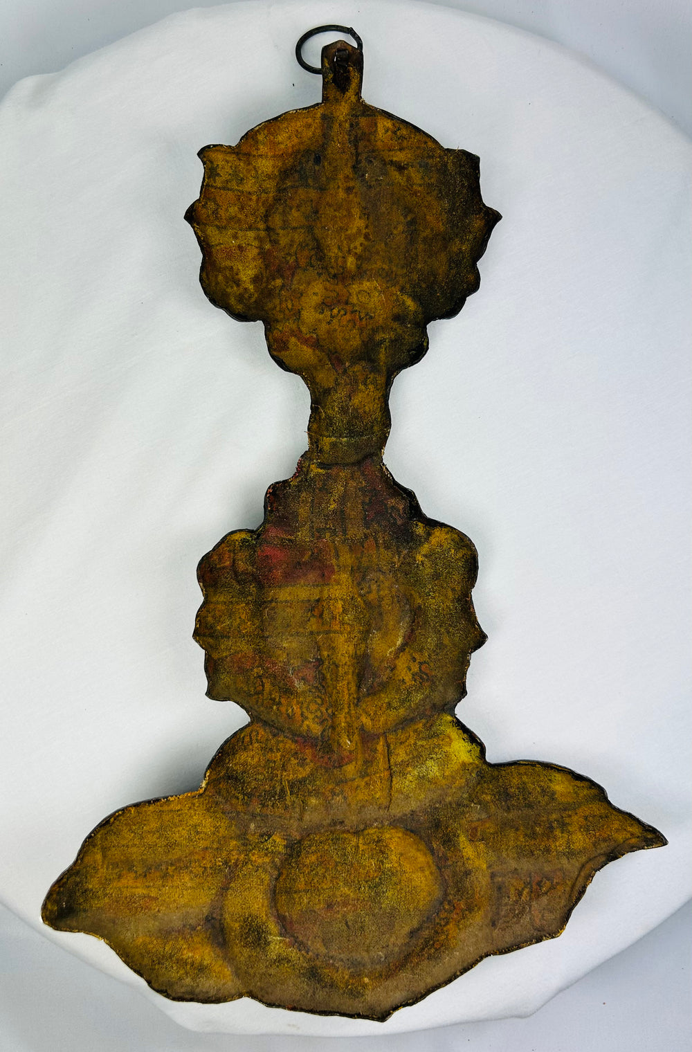 Bronze Buddhist altar ornament with gilt remnants and textile lining from medieval Japan