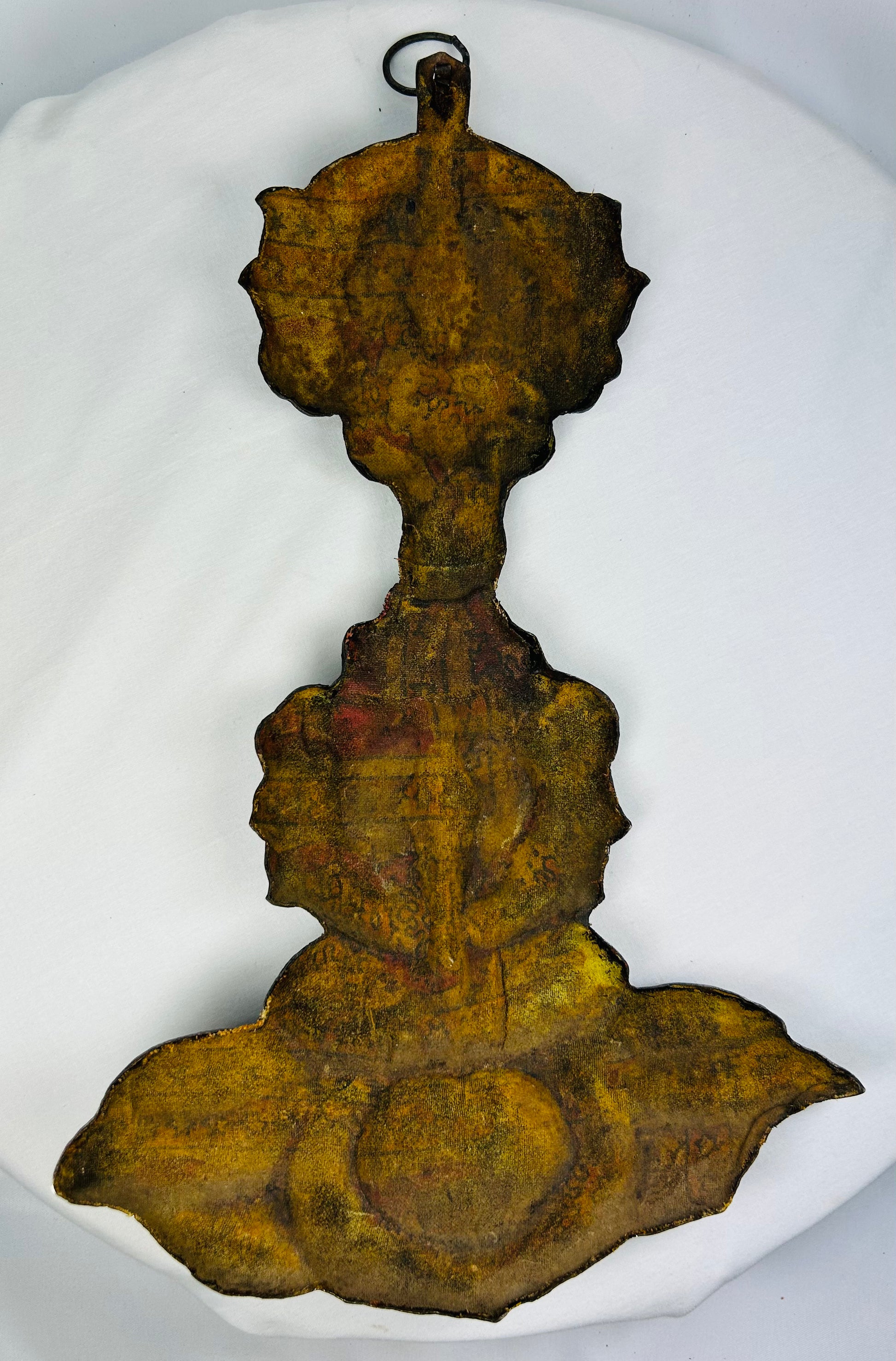 Bronze Buddhist altar ornament with gilt remnants and textile lining from medieval Japan
