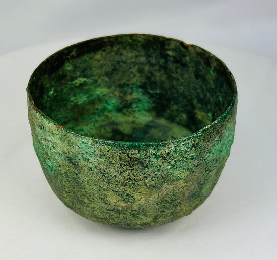 Early Iron Age Near Eastern bronze vessel with variegated green patina and earthen deposits