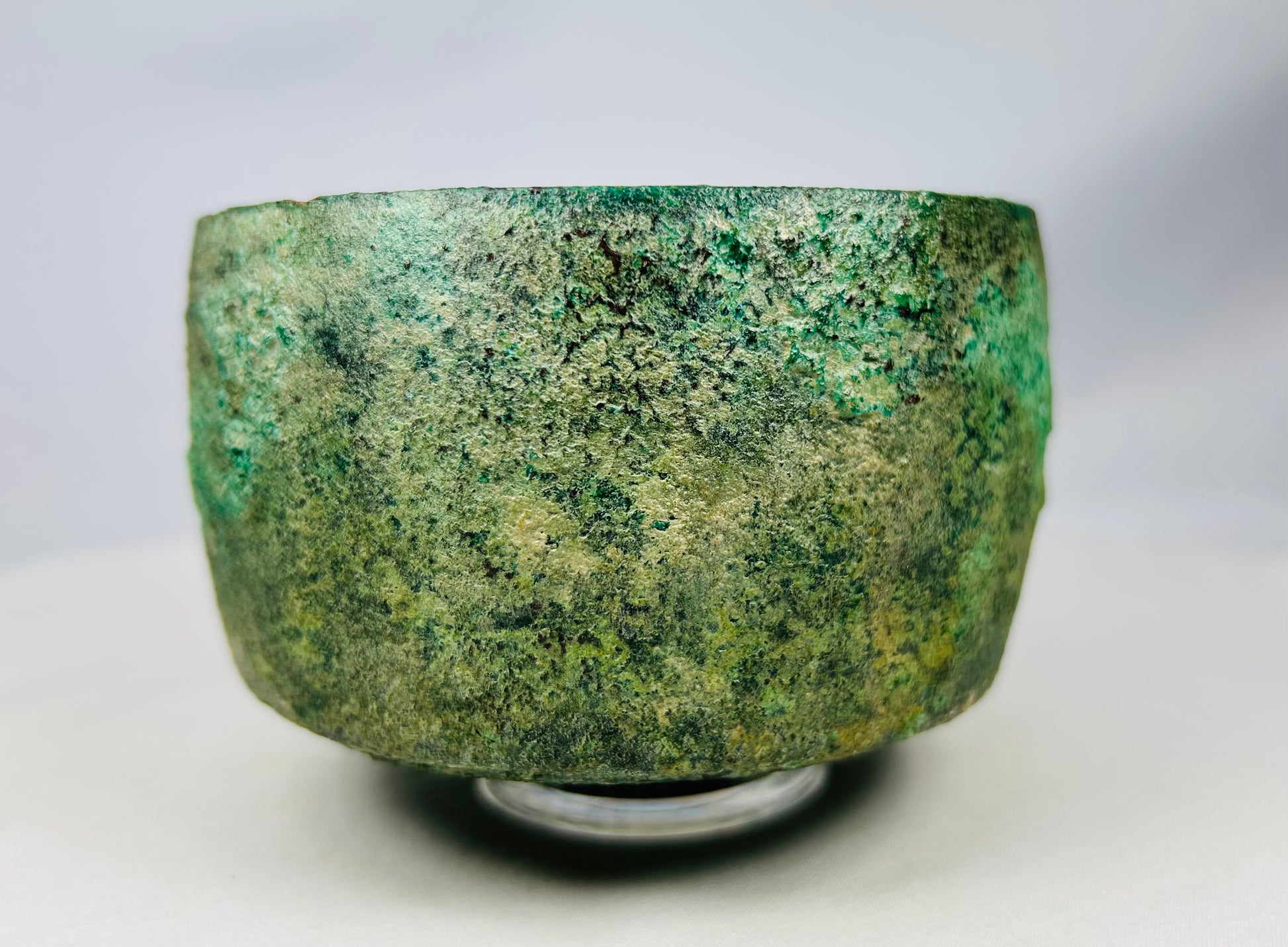 Ancient bronze bowl from Luristan, Iran displaying striking archaeological patina