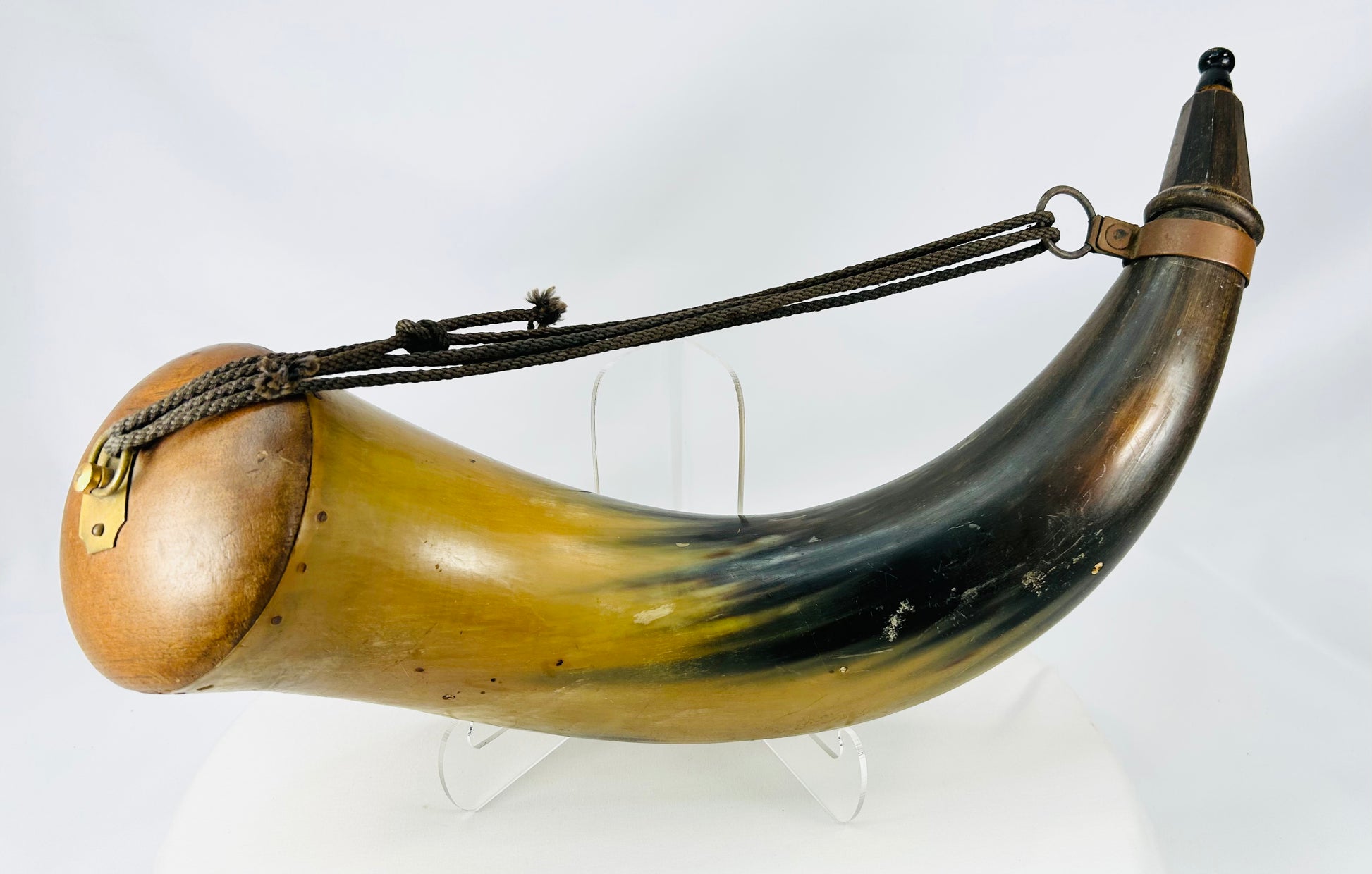 Antique frontier era powder horn with polished cow horn body and original fittings