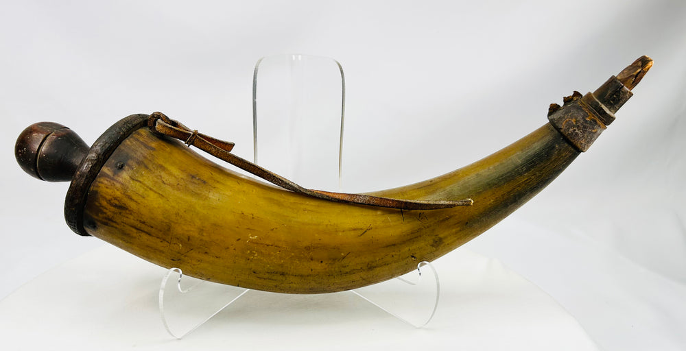 Historic North American powder horn with polished natural horn body and patinated surface