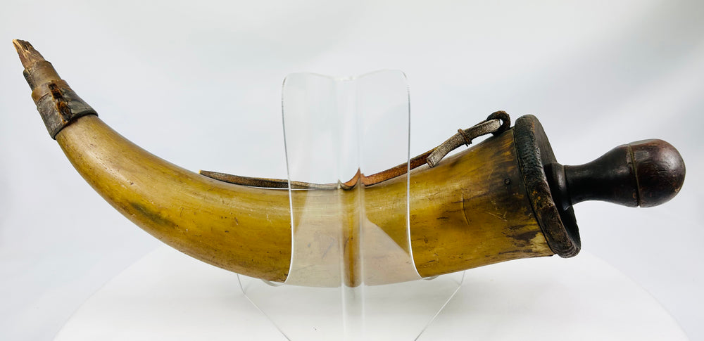 Late 18th century to early 19th century powder horn with natural patina and historical use marks