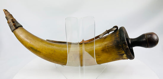 Late 18th century to early 19th century powder horn with natural patina and historical use marks