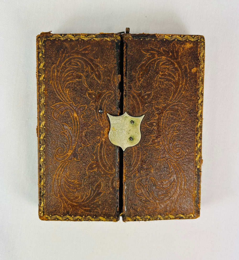 Victorian-era photographic portrait in leather-covered hinged case with embossed velvet interior