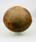 18th–19th century iron cannonball with stabilized oxidation and deep surface patina