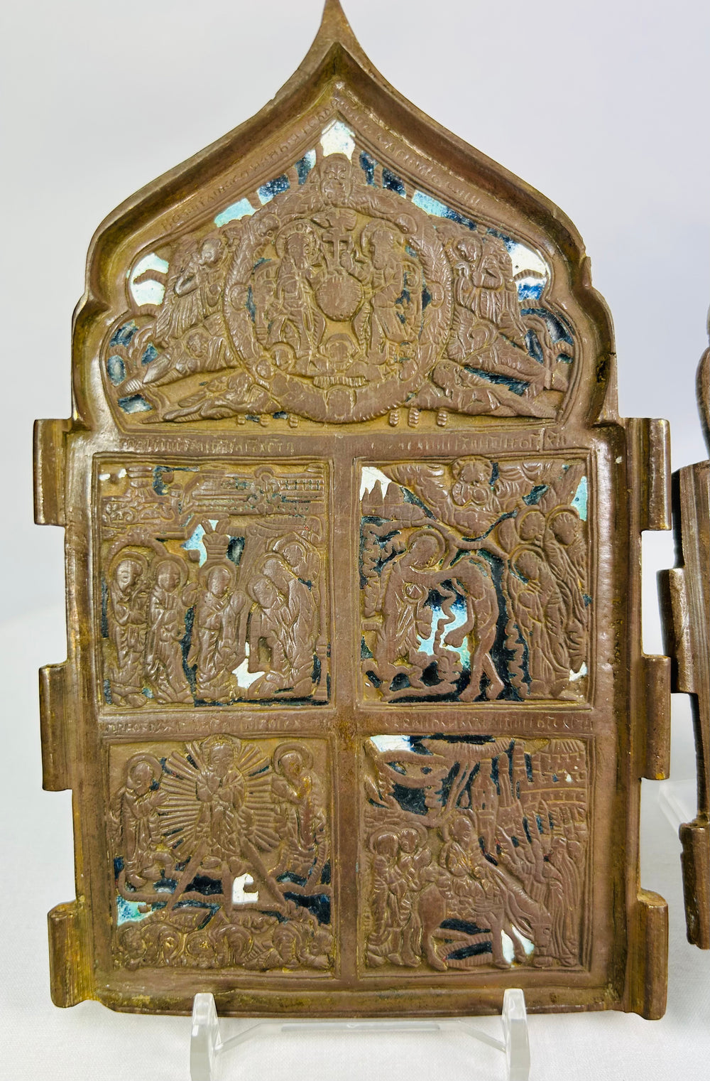 Matched set of Russian Orthodox devotional bronze travel icons with patina and enamel traces