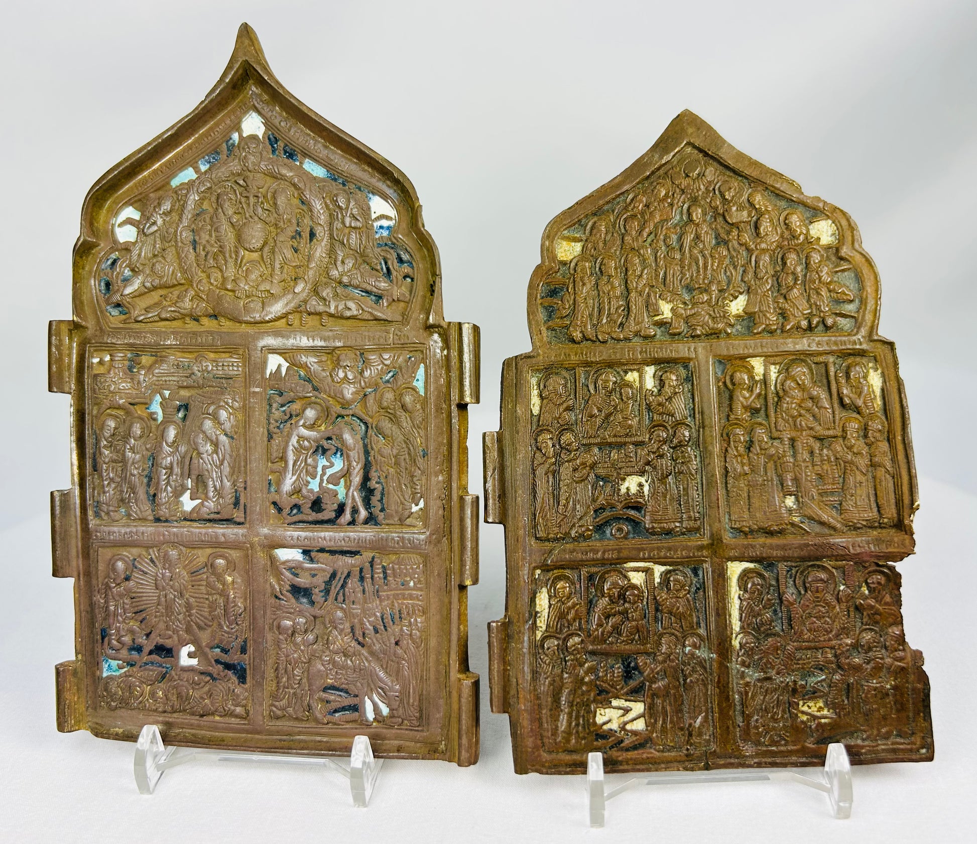 Bronze Orthodox icons with architectural frames and narrative relief scenes