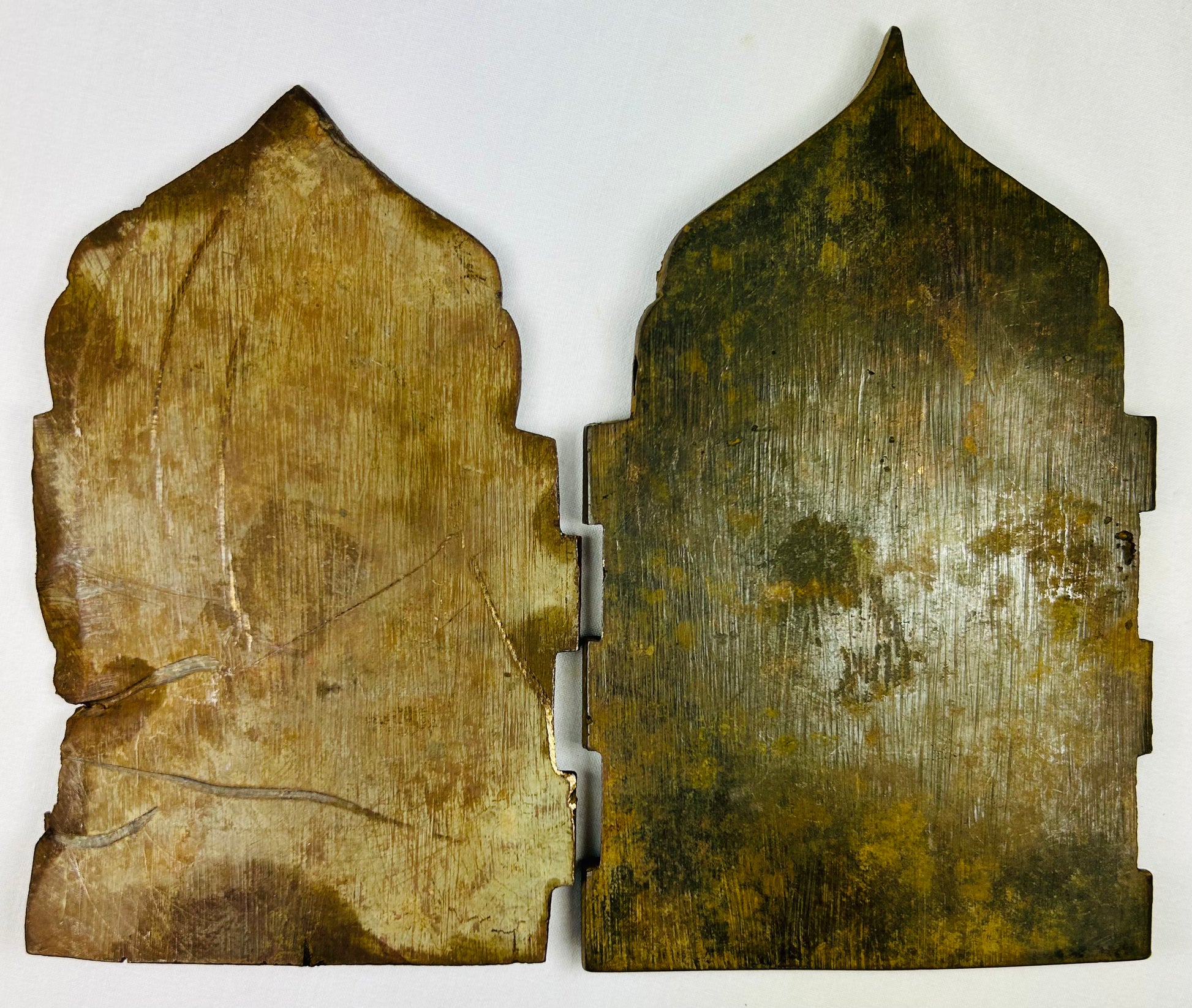 Russian Orthodox pilgrimage icons with cathedral-style tops and engraved inscriptions