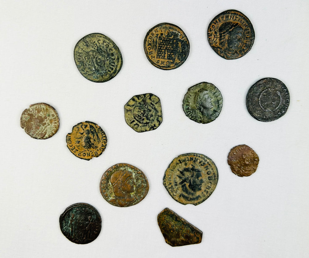 Authentic Roman coin obverse with emperor profile and archaeological surface wear