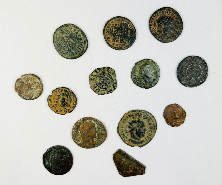 Authentic Roman coin obverse with emperor profile and archaeological surface wear