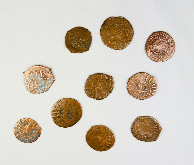 Authentic Crusader States bronze coin group showing hand-struck Christian symbols, irregular flans, and ancient green-brown patina.