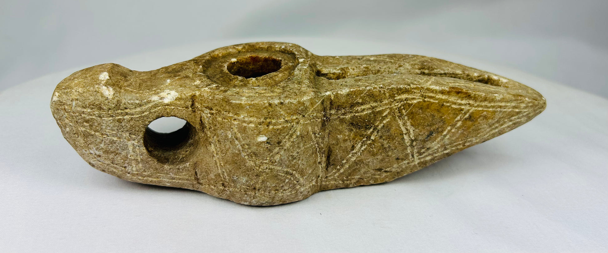 Medieval Middle Eastern stone oil lamp with wick spout and handle