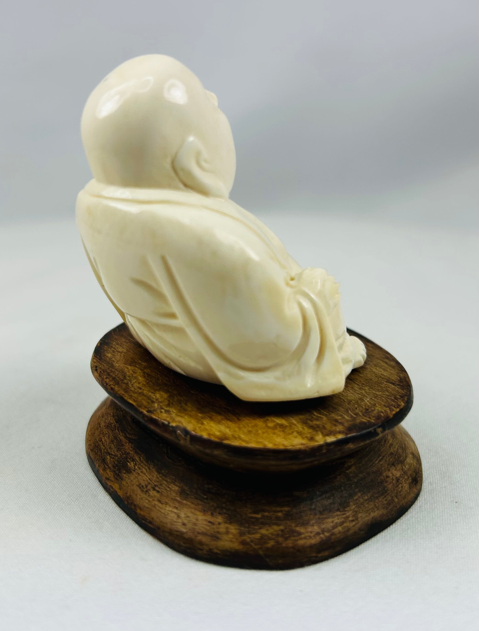 Museum-style Buddhist Laughing Buddha relic with beautiful aged patina