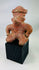Authentic Pre-Columbian terracotta figure with stylized features and red slip