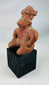 West Mexican ceramic tomb figure with pierced ears and elaborate headdress