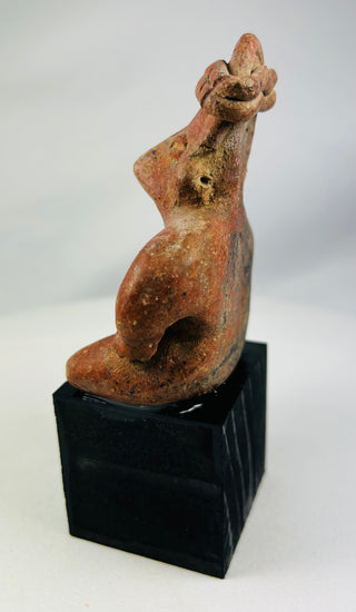 Ancient West Mexico artifact with mineral deposits and burial patina