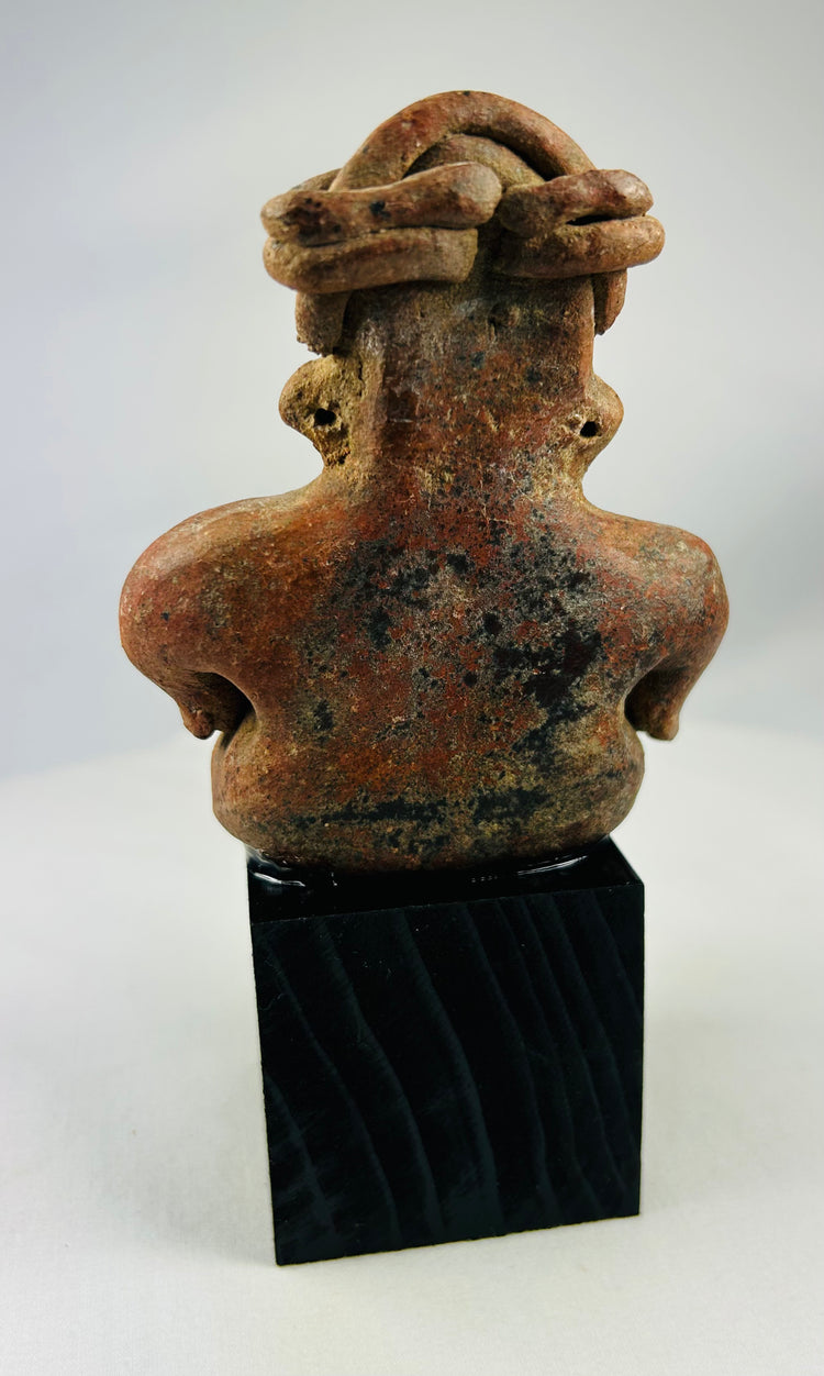Terracotta shaft tomb culture figure with bold facial features and desert toning