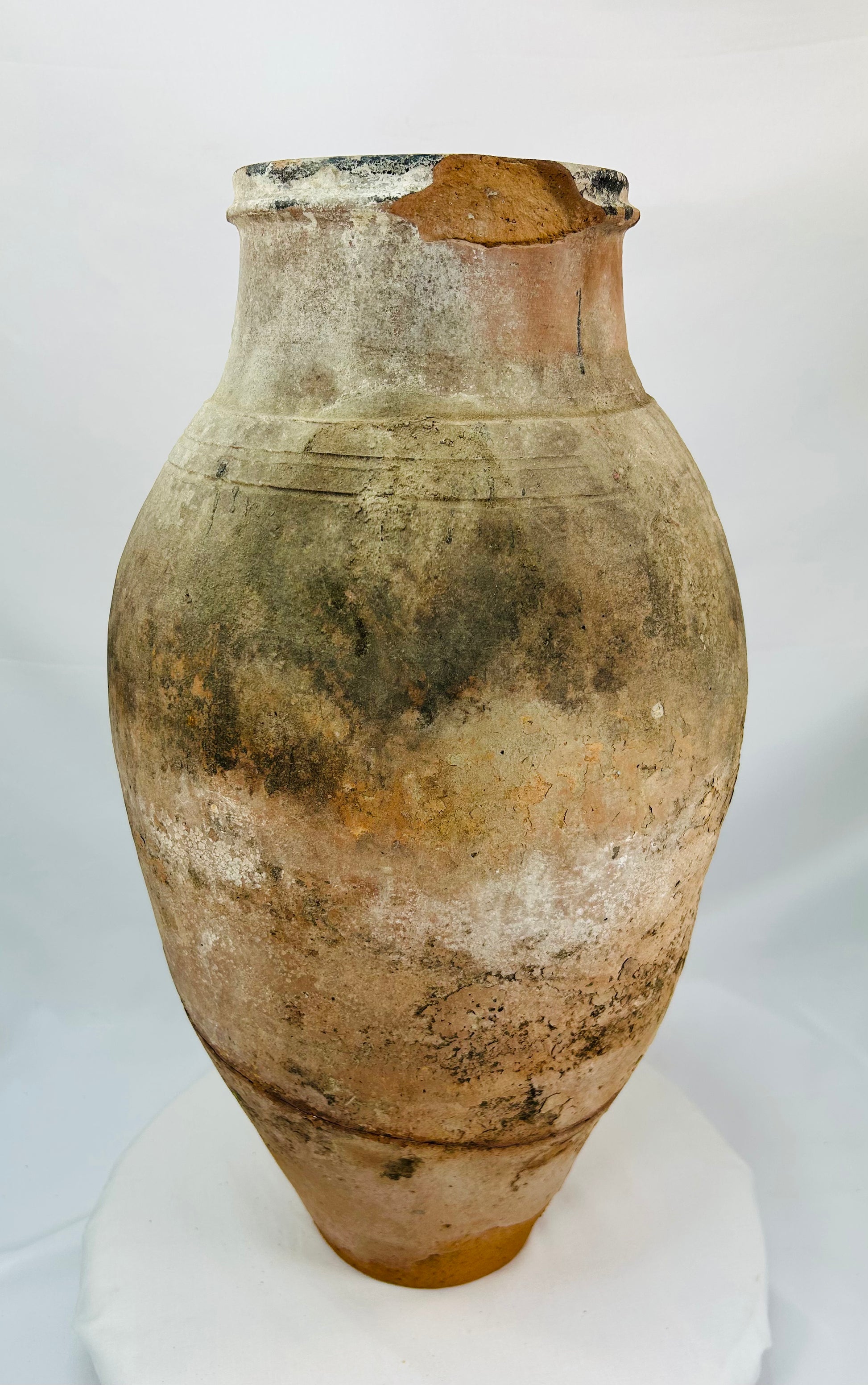 Authentic Byzantine Aegean Sea amphora with aged surface wear and ocean-related encrustation
