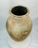 Eastern Mediterranean Byzantine ceramic storage jar with olive-shaped body and aged finish