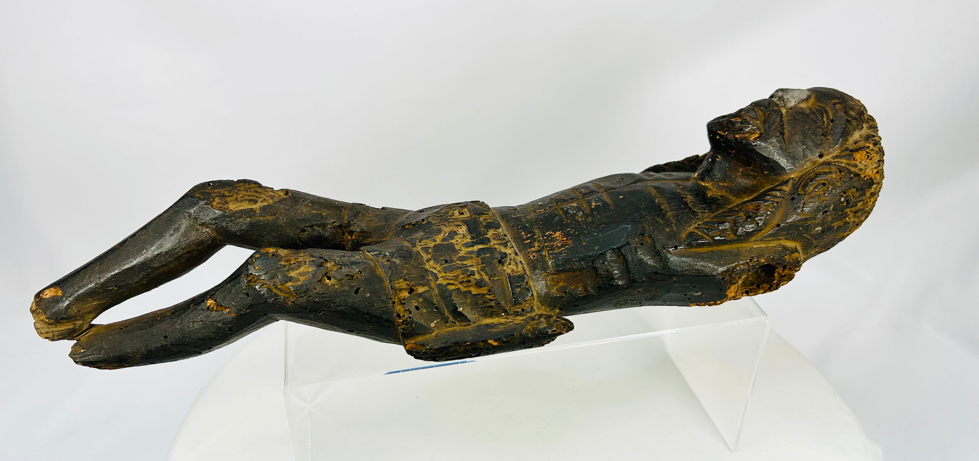 Weathered 16th century wooden Christ figure with expressive carved features