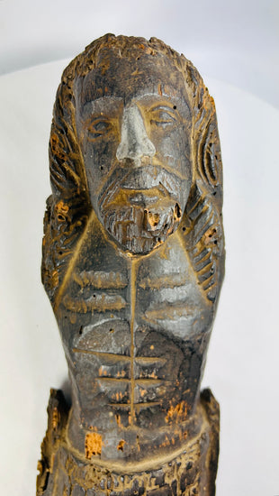 Antique Colonial-era Christian devotional carving with historical deterioration