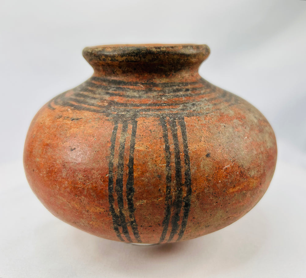 19th–20th century West African terracotta pot with tribal linear decoration