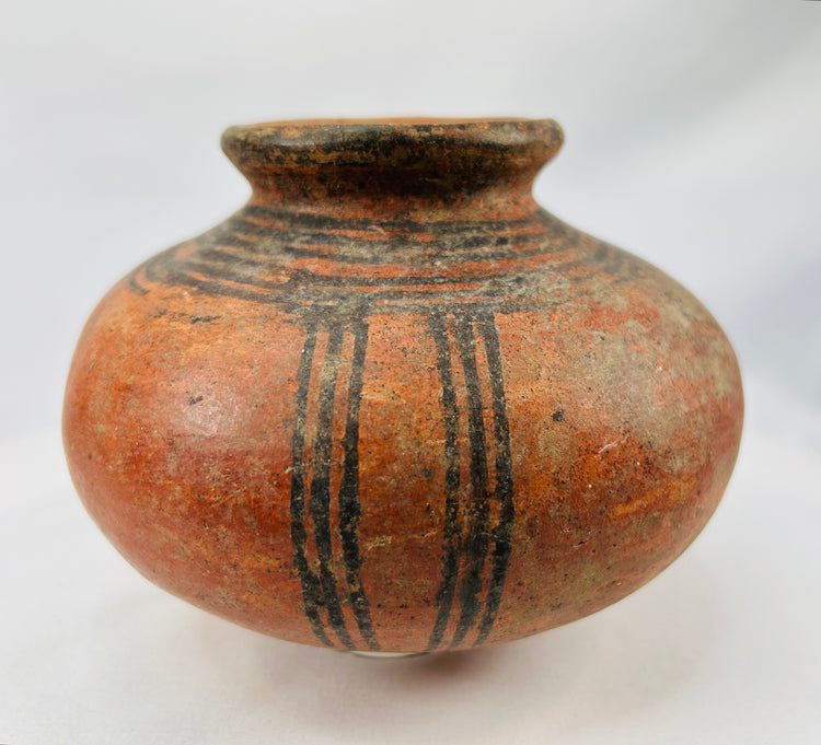 19th–20th century West African terracotta pot with tribal linear decoration