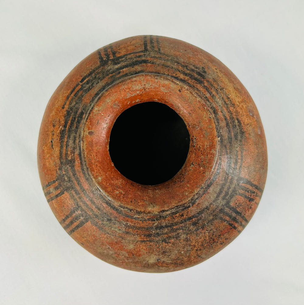 Ethnographic West African pottery with black painted shoulder banding