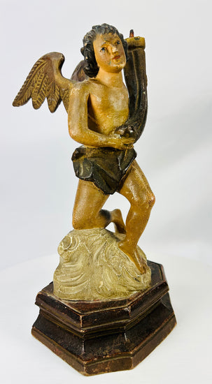 European devotional carved angels with polychrome remnants and aged wear