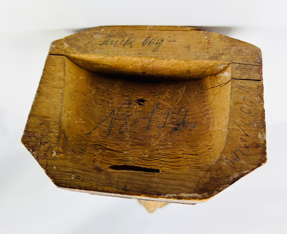 Pair of antique wooden putti with feathered wings and flowing drapery