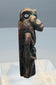 Side profile of an ancient Egyptian Sekhmet-attributed amulet with a projecting feline muzzle