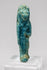Front view of an Egyptian lioness-headed goddess amulet with surviving turquoise-blue glaze