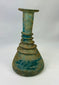 Authentic Roman glass bottle circa 1st–3rd century CE with encrusted turquoise coloration