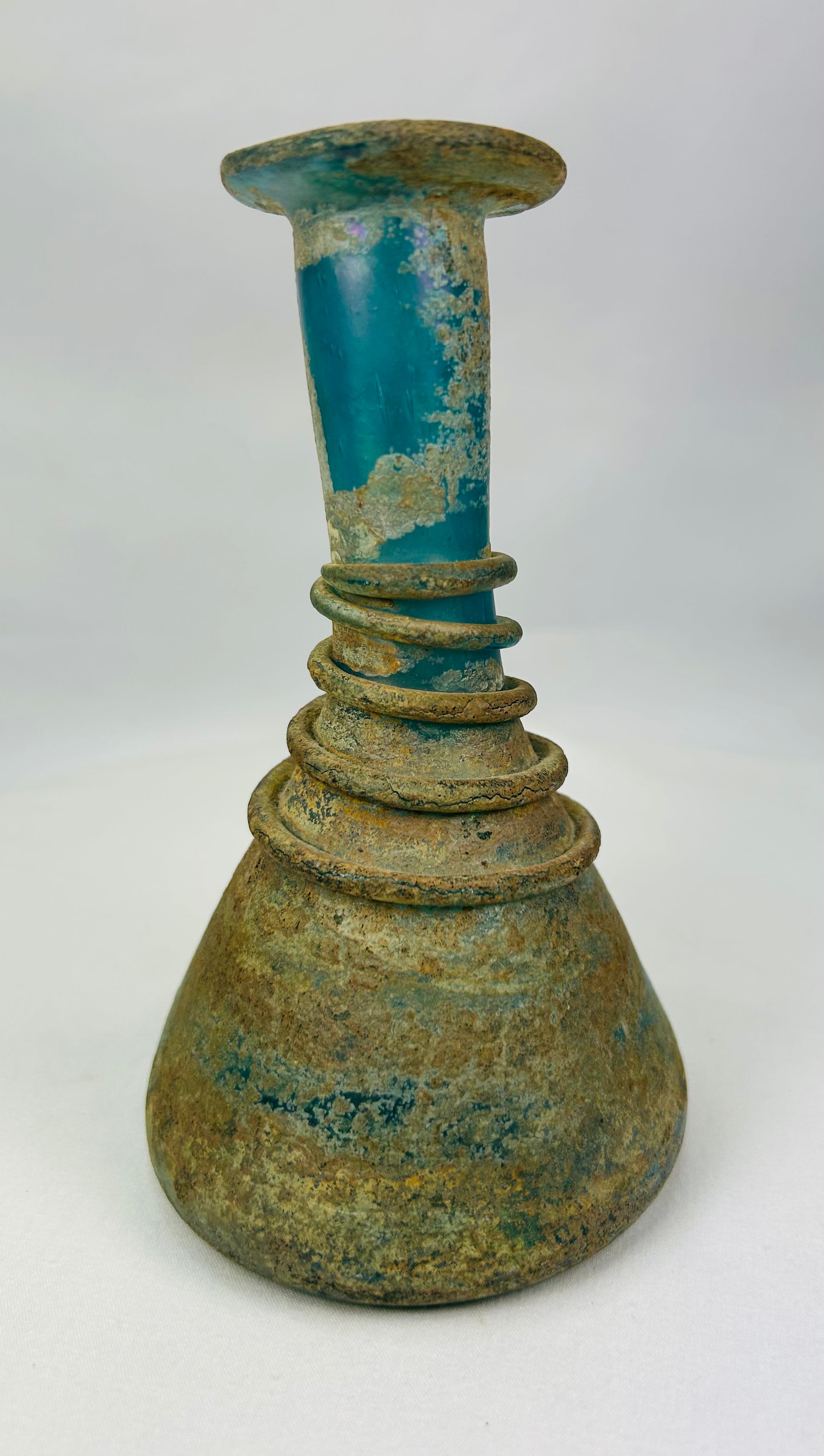 Archaeological Roman glass artifact with beautiful mineral weathering and patina