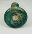 Rare Roman glass collectible with turquoise body and elegant conical form