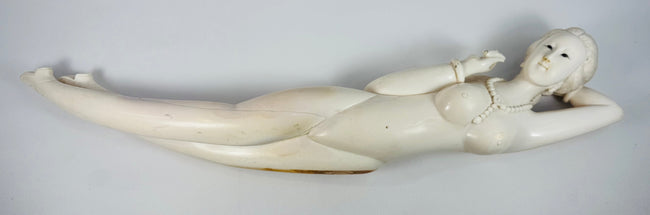 Underside view showing circular plugs, staining, old restoration and construction details