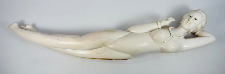Underside view showing circular plugs, staining, old restoration and construction details