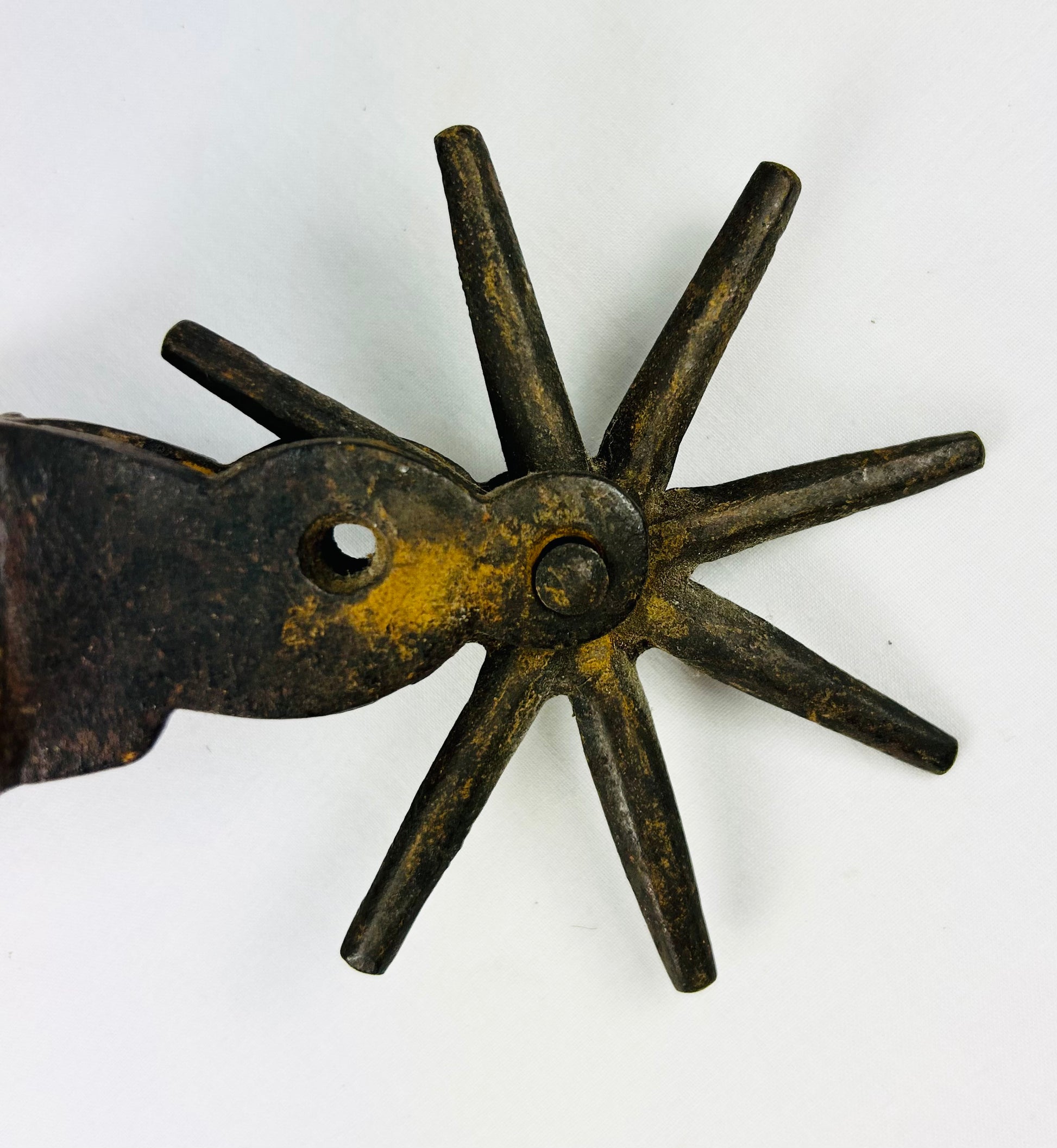 Western collectible antique cowboy spurs with bold forged iron construction